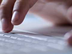human hands at a keyboard