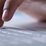 human hands at a keyboard